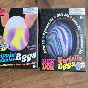 2 Nee Doh Dippin Dazzler Eggs - Purple and Blue Learning Toy